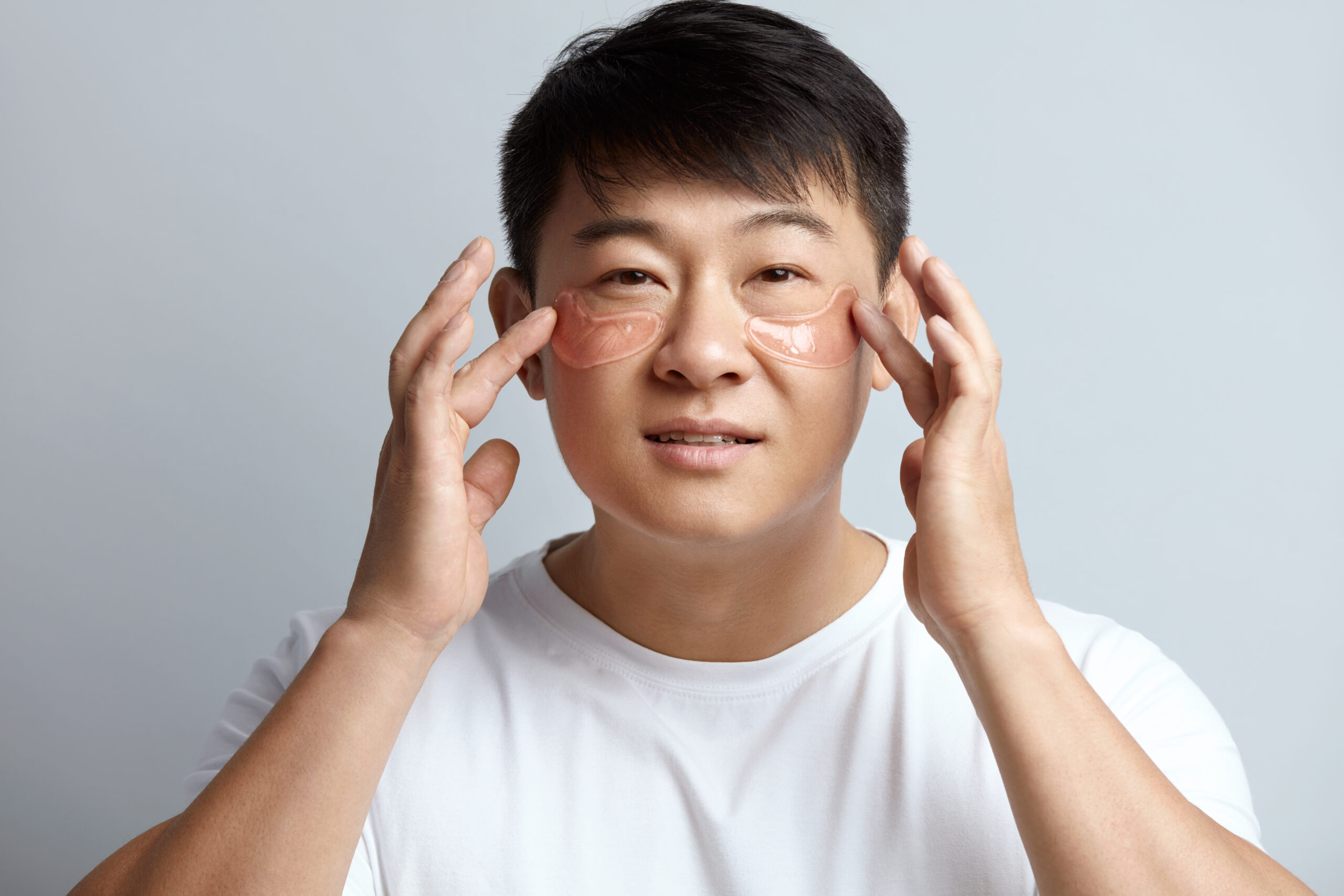 man having peptide eyecare treatment