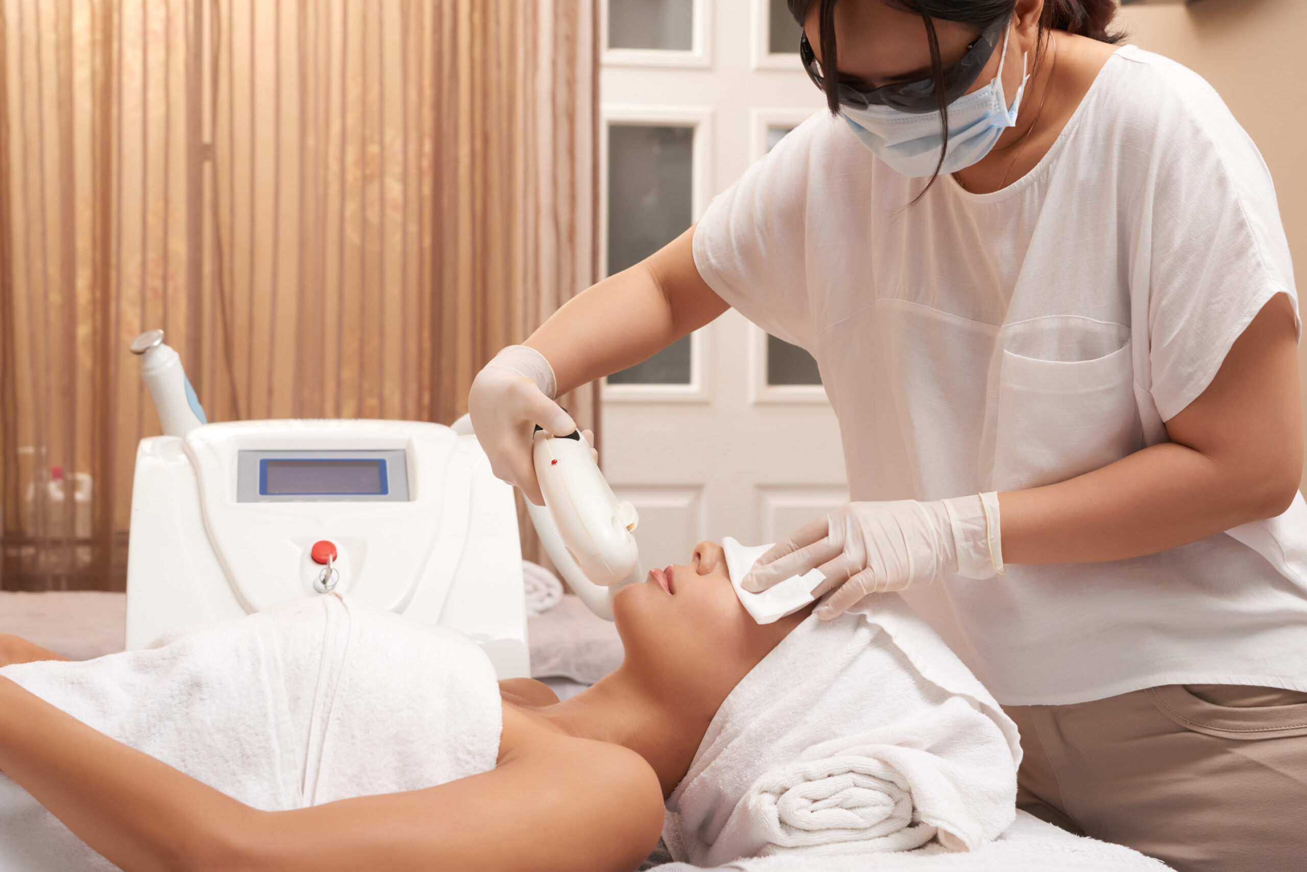 Woman having a face treatment